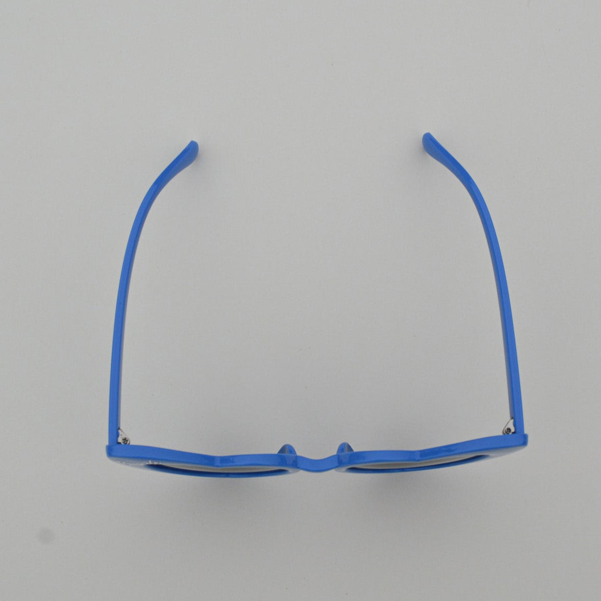 Blue eyeglass frame on a gray background