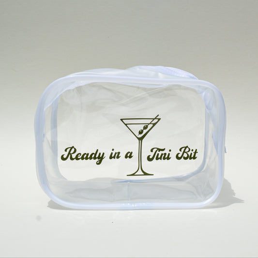 Clear bag with green lettering that reads 'Ready in a Tini Bit' with a martini theme on a white background