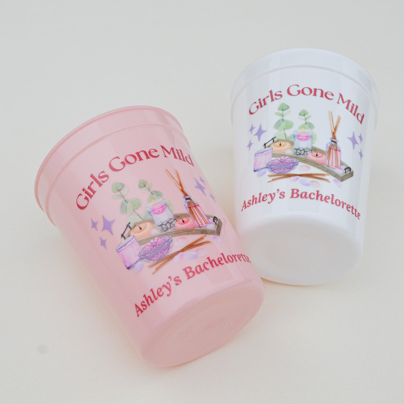 Two personalized cups with 'Girls Gone Mild' and 'Ashley's Bachelorette' text on a white background.